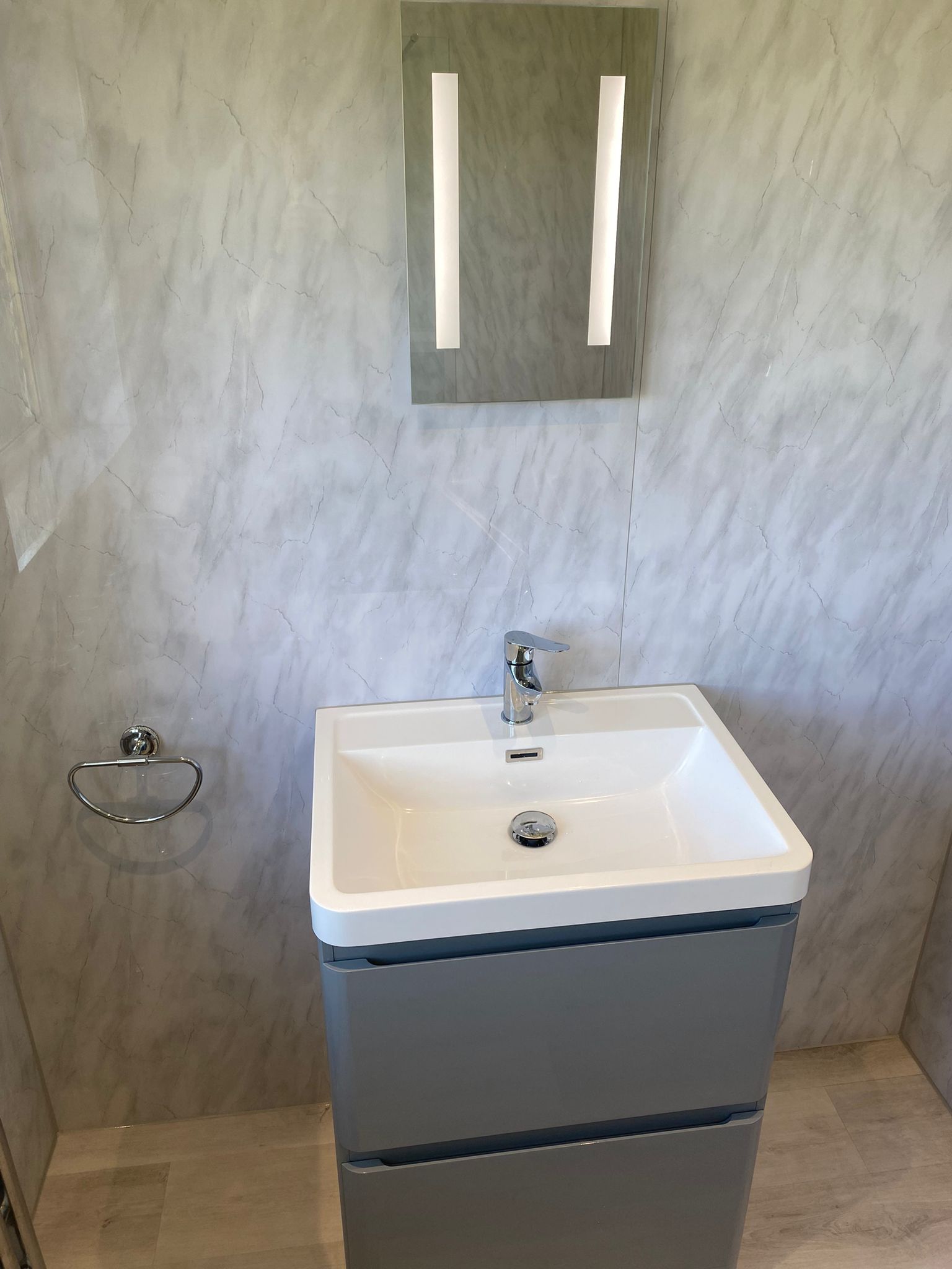 Grey shower enclosure and vanity