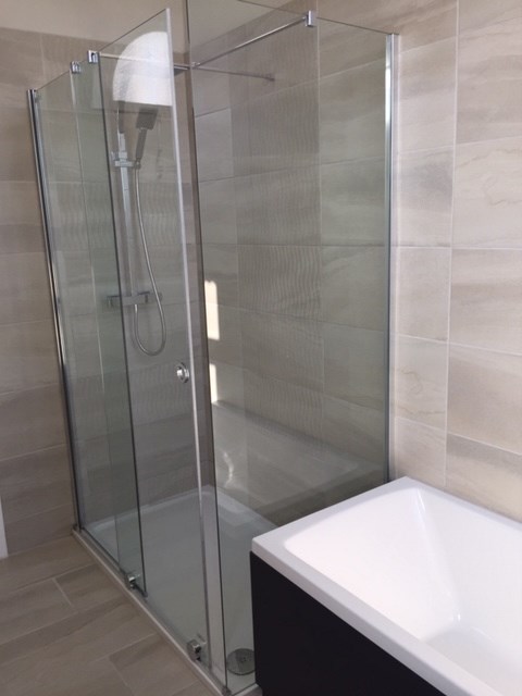 Bright marble family bathroom